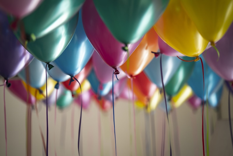 Birthday luxury surprise celebration with balloons and gold lights